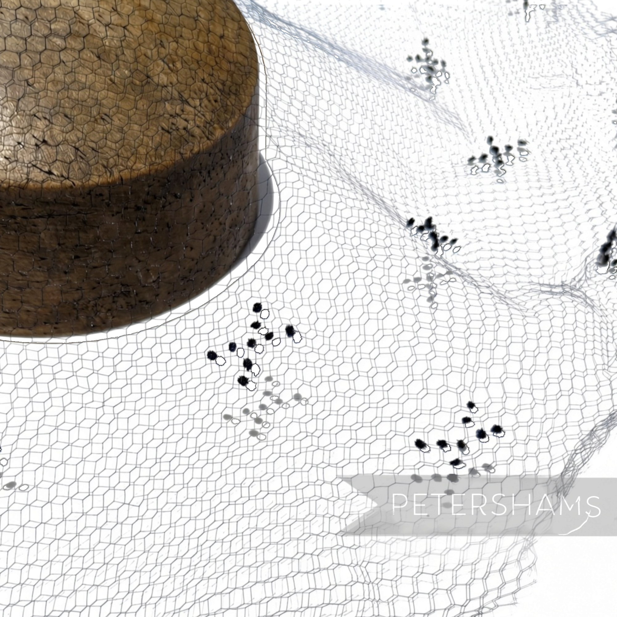 Petershams Millinery Supplies vintage 1930s honeycomb veiling round with black X-shaped embroidery details.