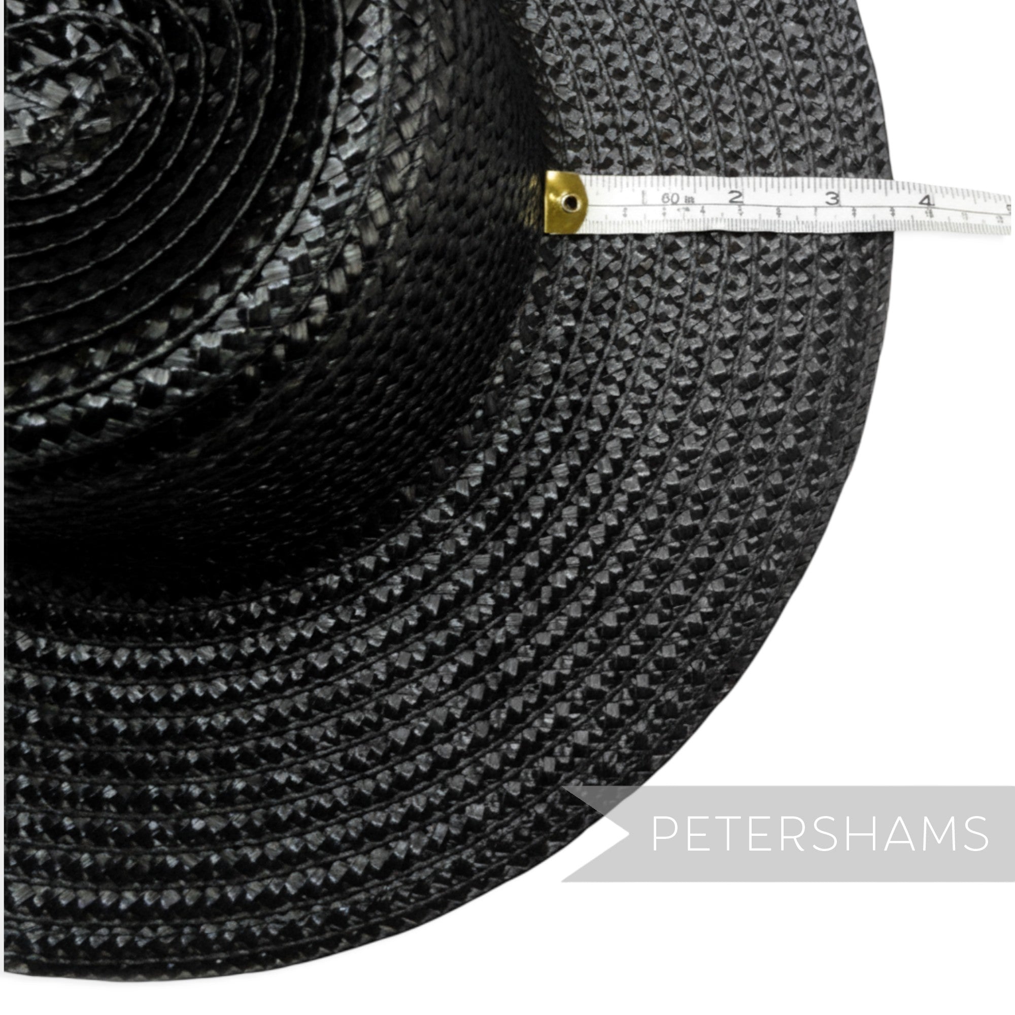 Petershams Millinery Supplies black shiny flat polybraid capeline hat body with measuring tape showing brim width