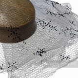 Petershams Millinery Supplies vintage black honeycomb veiling round with X-shaped dotted accents for hat making
