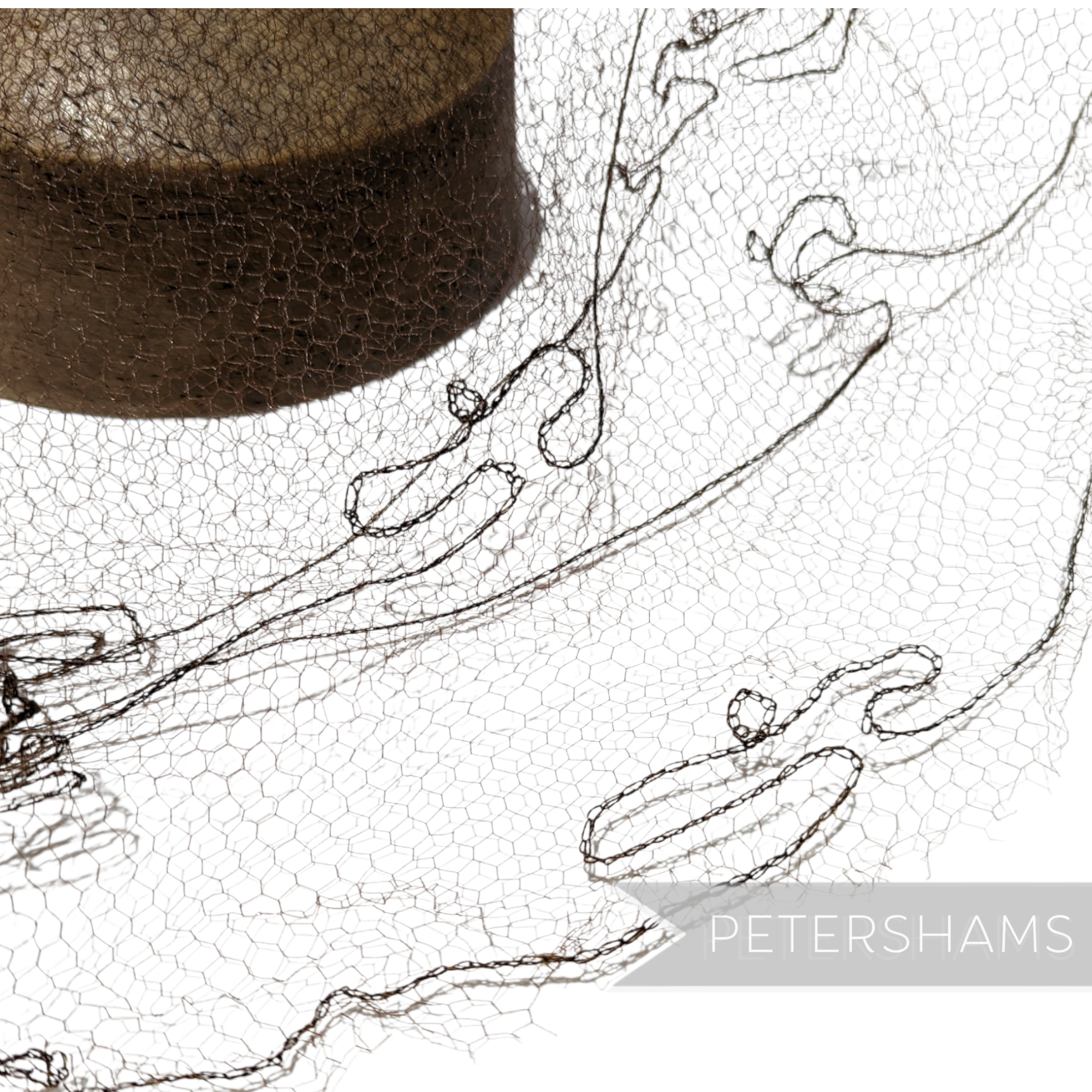 Petershams Millinery Supplies vintage 1930s honeycomb veiling round with chainlink stitch and small swirl details.
