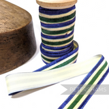 Petershams Millinery Supplies 23mm striped French velvet ribbon in blue, green, and cream on a wooden spool.