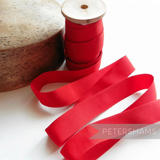 Petershams Millinery Supplies 25mm wide red vintage grosgrain ribbon on a wooden spool for hat trimming