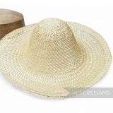 Petershams Millinery Supplies natural undyed straw and twisted paper cord capeline hat body with open weave design.