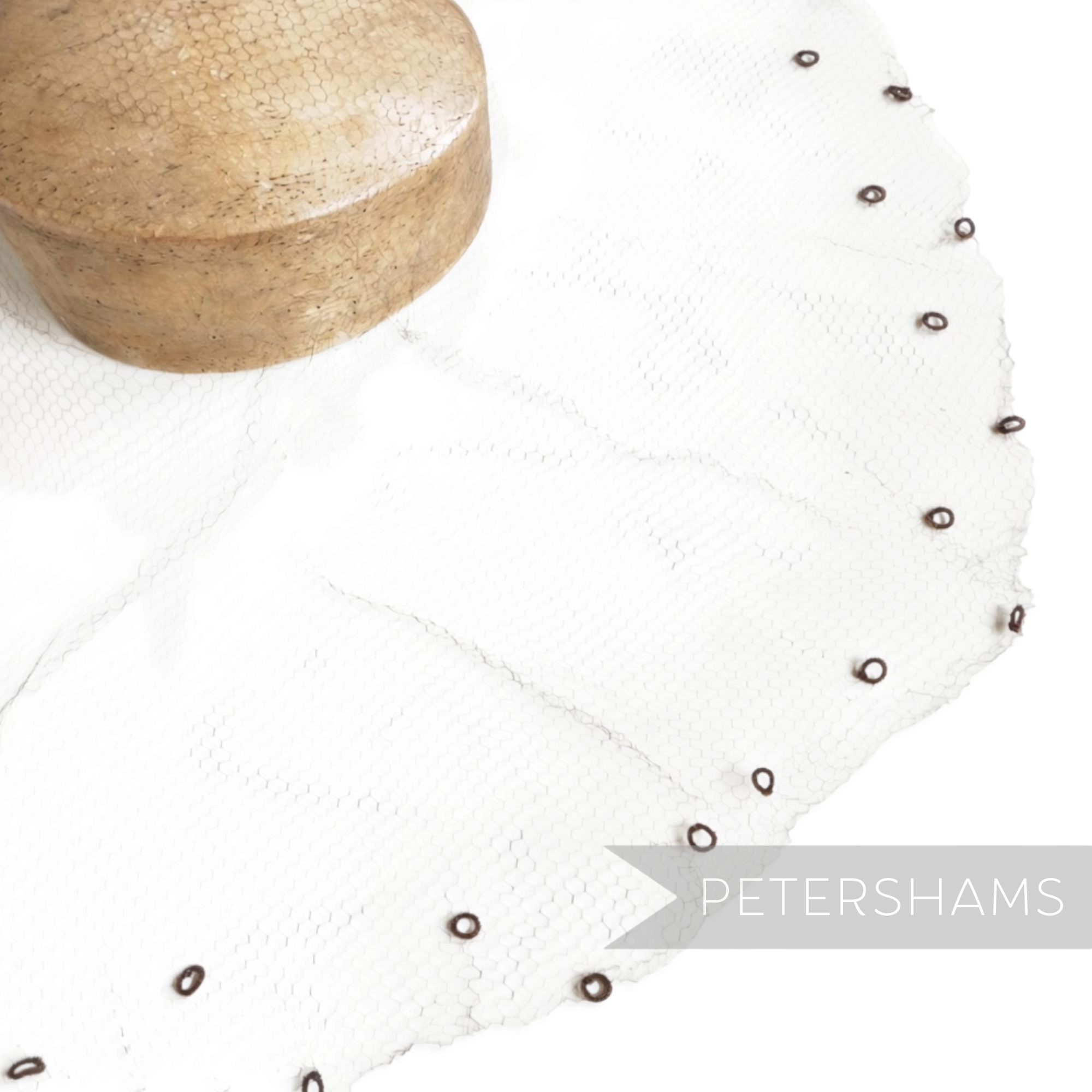 Petershams Millinery Supplies vintage 1930s honeycomb veiling round with chenille circle details on a wooden hat block