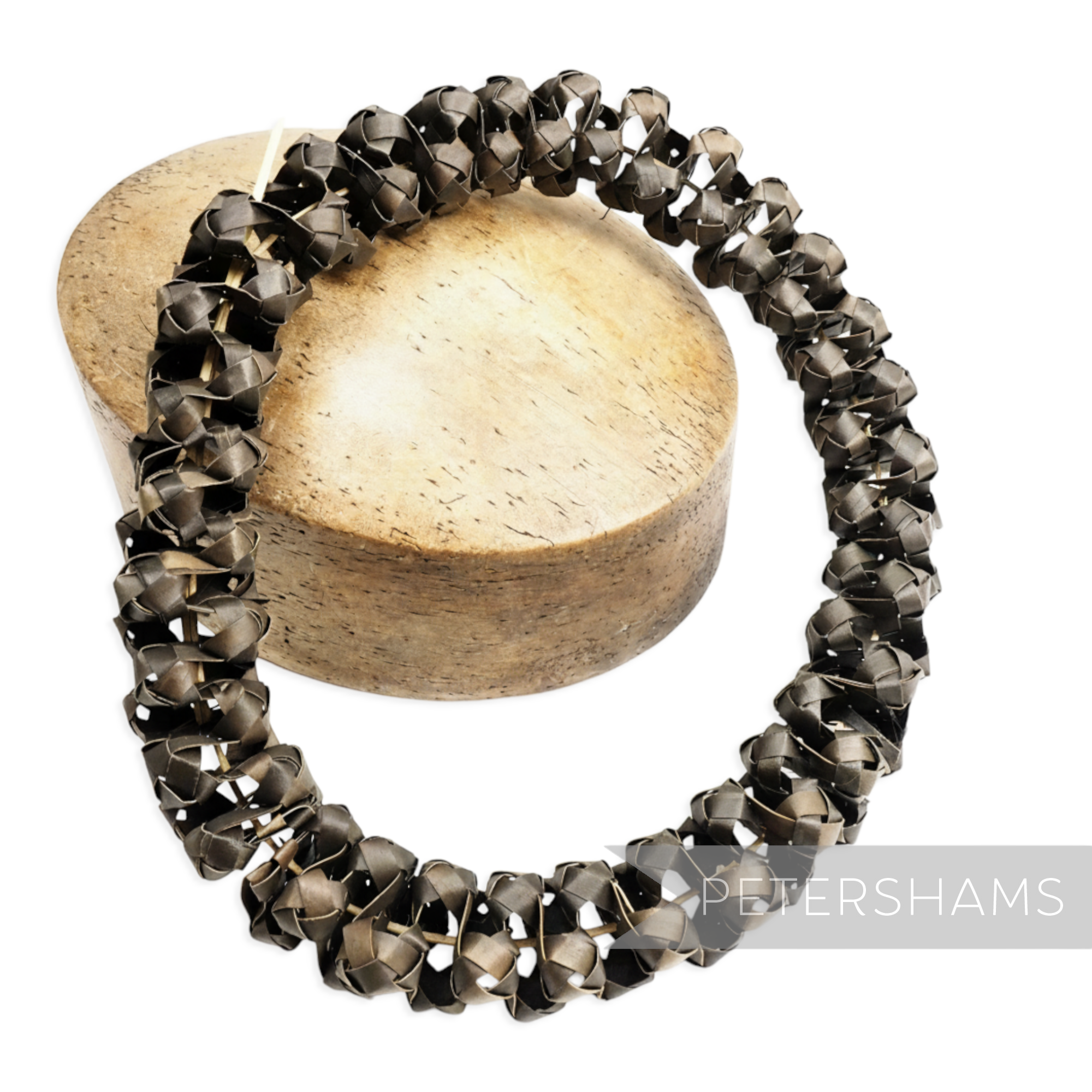 Petershams Millinery Supplies handwoven black straw adjustable headdress frame for floral millinery projects.