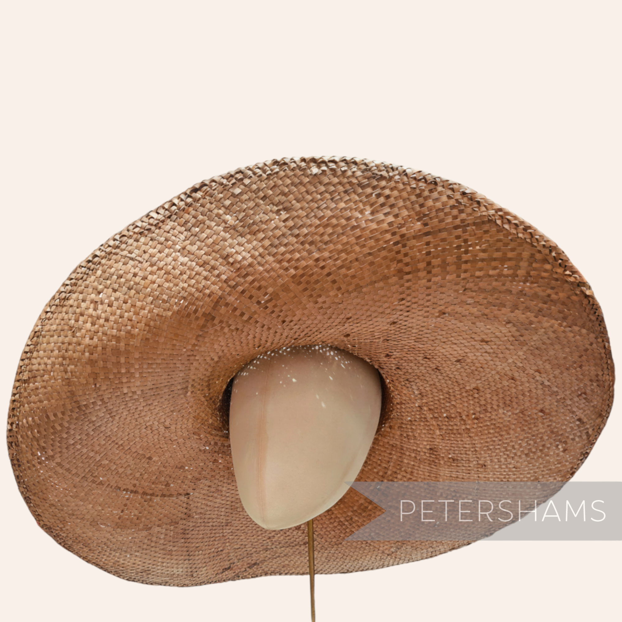 Petershams Millinery Supplies extra large stiff strip straw capeline hat body with a wide brim and cane edge