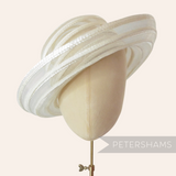 Petershams Millinery Supplies white swirled crin and shiny polybraid capeline hat body on a mannequin head