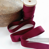 Petershams Millinery Supplies 25mm wide vintage burgundy grosgrain ribbon for hat trimming and millinery projects.