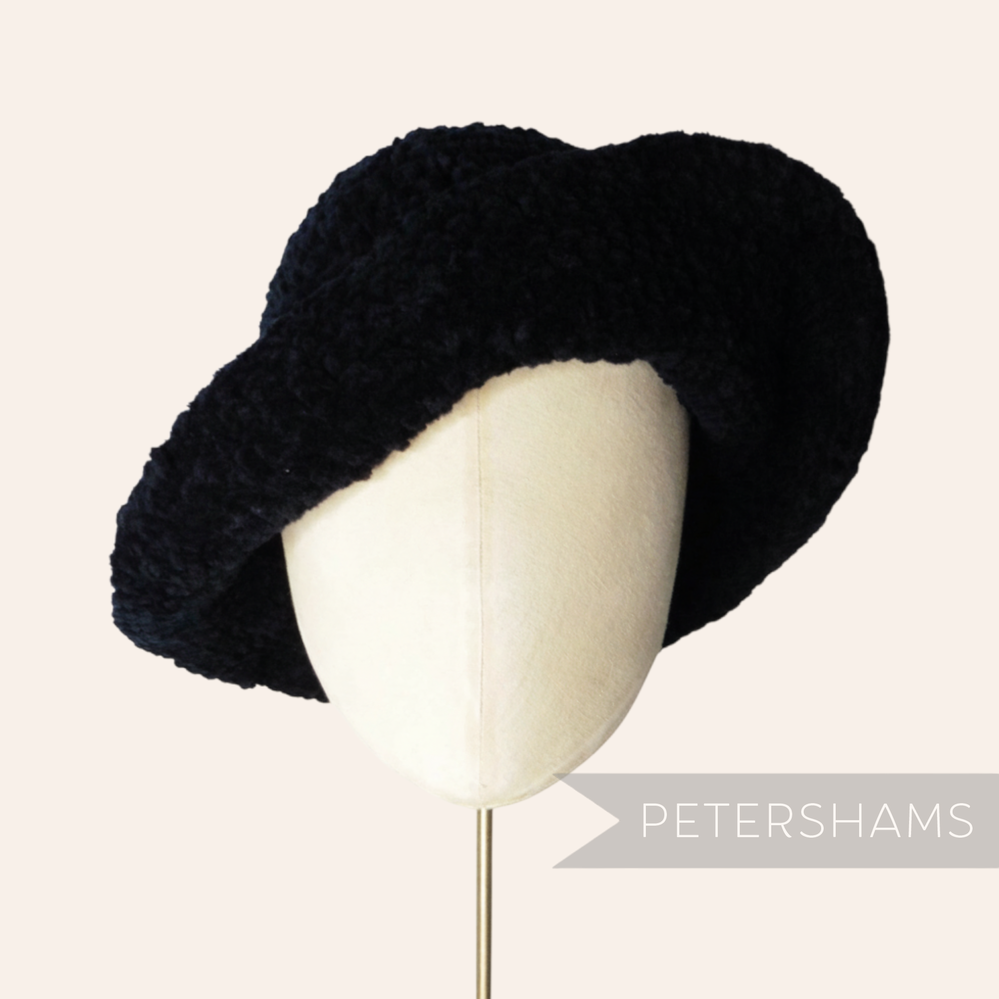 Petershams Millinery Supplies vintage 1990s navy blue chenille knitted cone hat body on a mannequin head