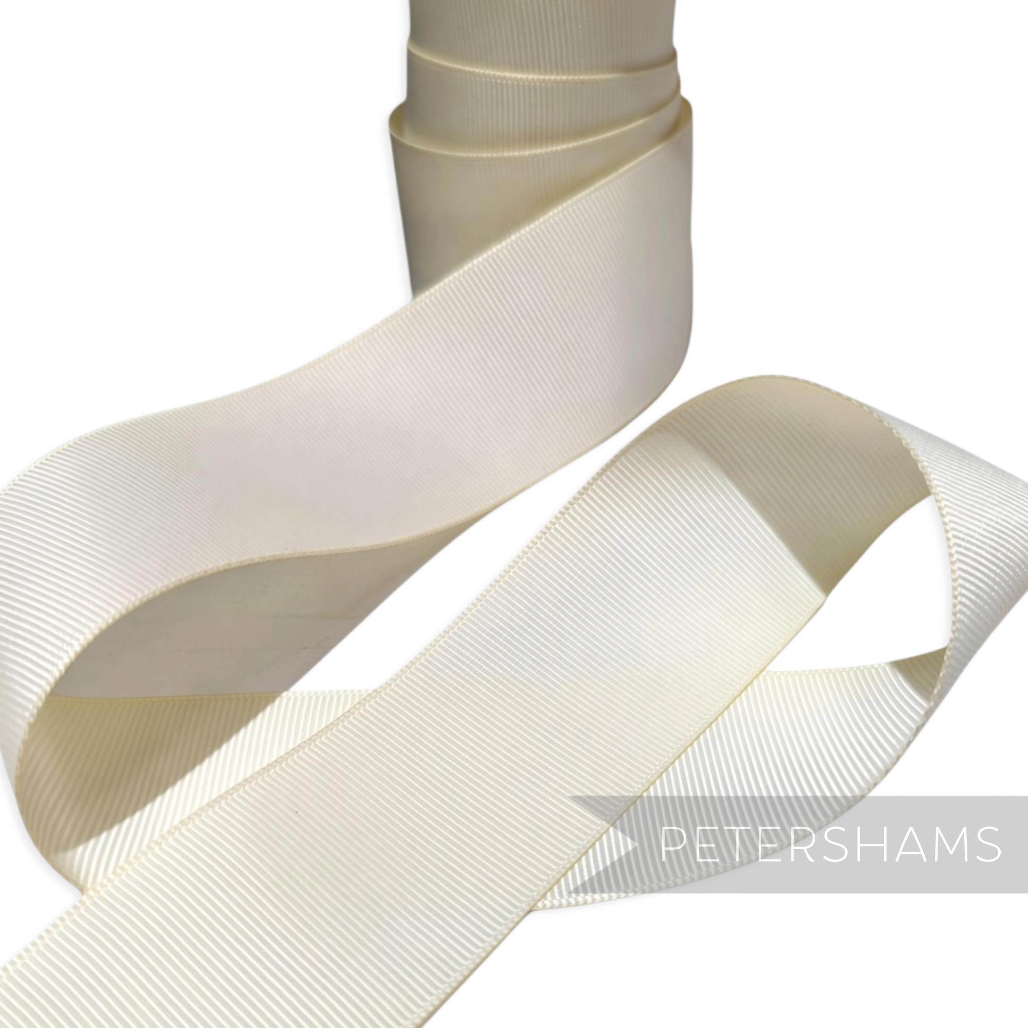 Petershams Millinery Supplies 38mm wide cream polyester grosgrain ribbon with a ribbed texture for craft projects.