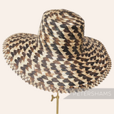 Petershams Millinery Supplies capeline hat body in natural bark straw with a detailed plaited brim edge