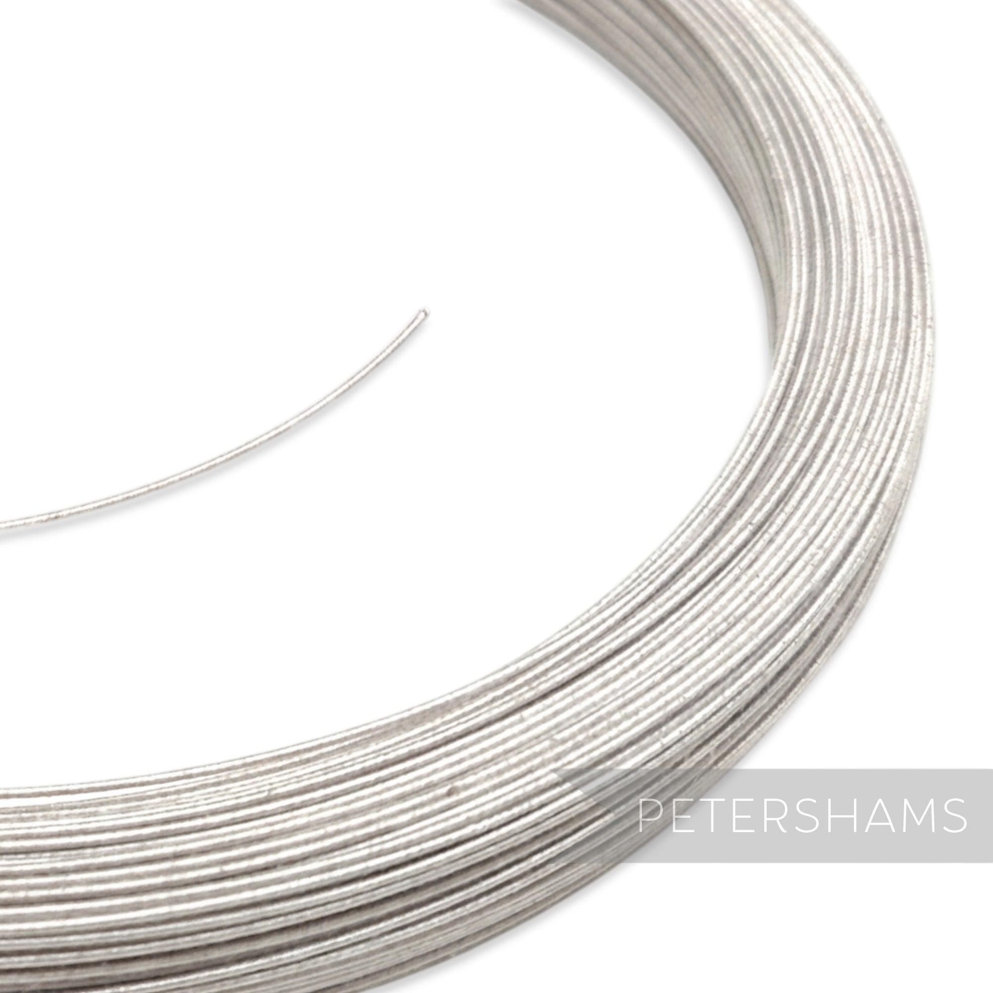 Petershams Millinery Supplies 0.8mm steel millinery wire covered in black cotton for hat making and floral crafts.