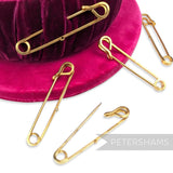 Petershams 63mm gold plated brass safety pin with a single hole for embellishments. Vintage 1980s trim.