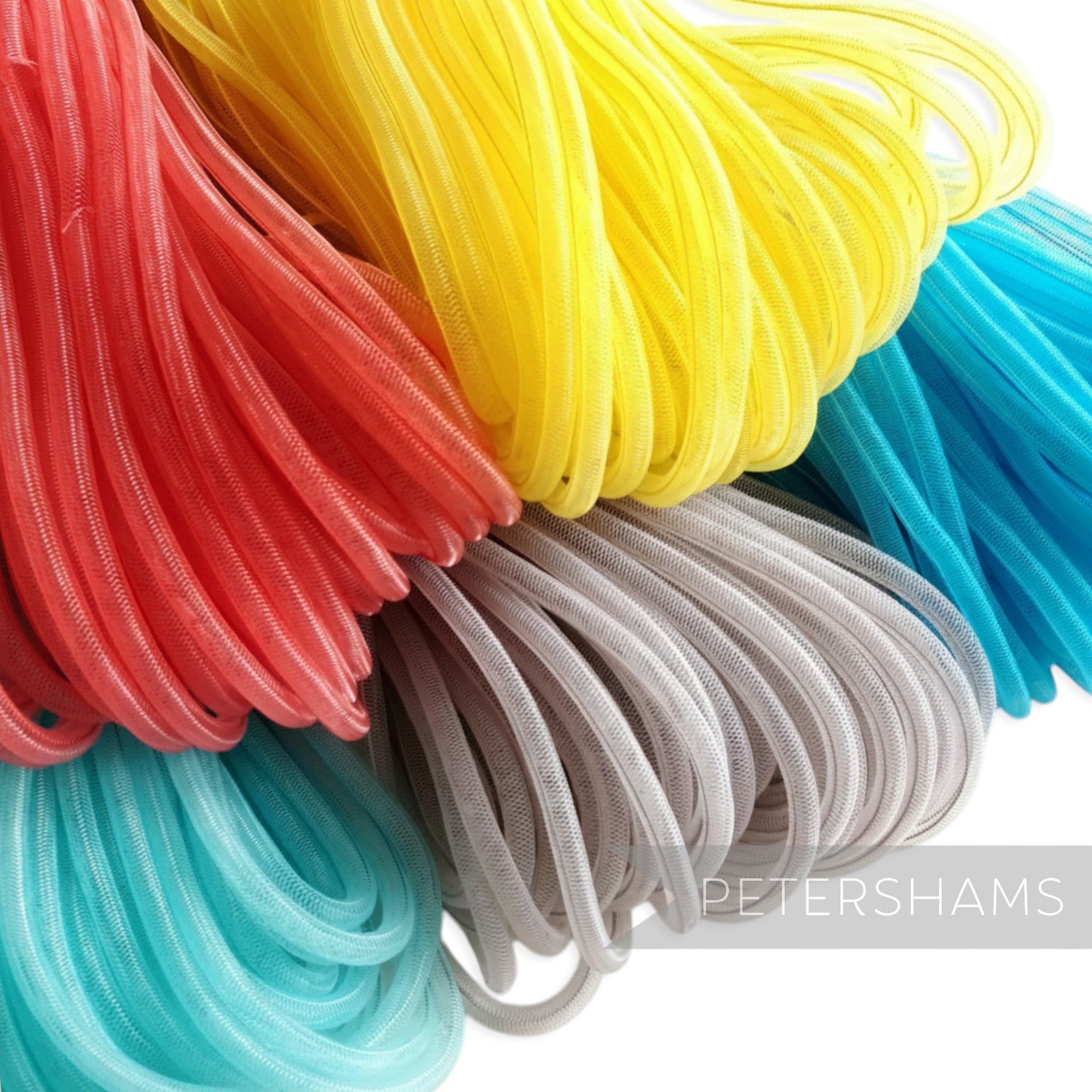 Petershams Millinery Supplies 6mm tube crin in red, yellow, blue, grey, and turquoise. Slightly sheer, gathered trim for hat making.