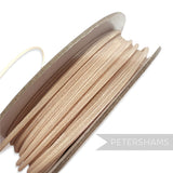Petershams Millinery Supplies beige 2.5mm tubular crinoline netting on a spool, ideal for headbands and graphic shapes.