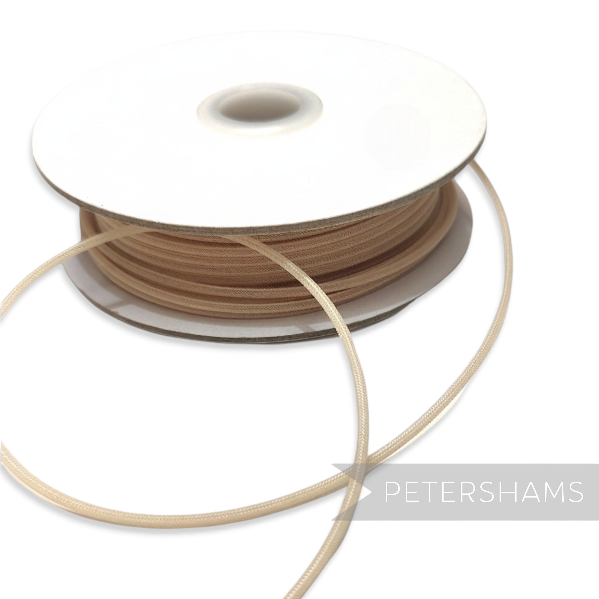 Petershams Millinery Supplies beige 2.5mm tubular crinoline with central thread for headbands and graphic shapes.