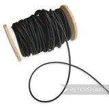 Petershams black 2.5mm tubular millinery crinoline on a wooden spool, perfect for headbands.