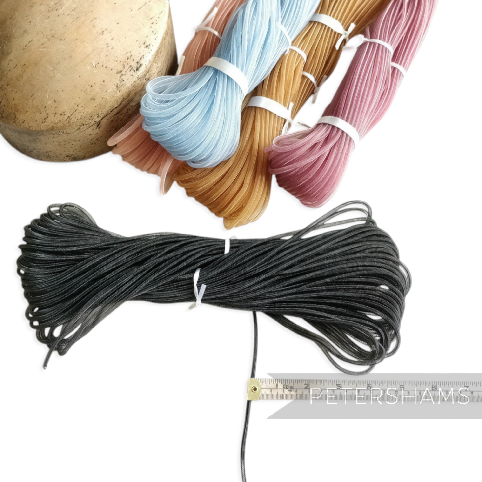 Petershams black 4mm tube millinery crin netting, ideal for hat making and trims. Also available in pastel shades.