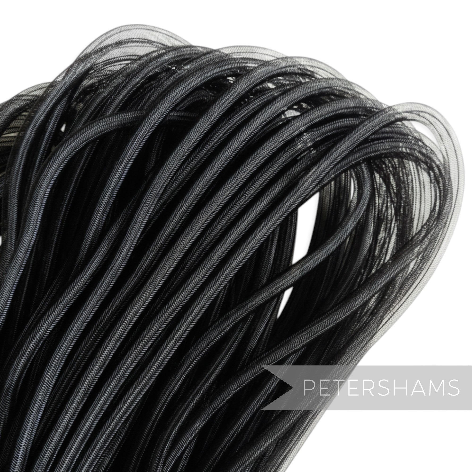 Petershams black 8mm tube millinery crin, a slightly sheer mesh trim for hat making and decorative use.