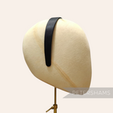 Petershams black satin covered plastic headband, 24mm wide, ideal for millinery.