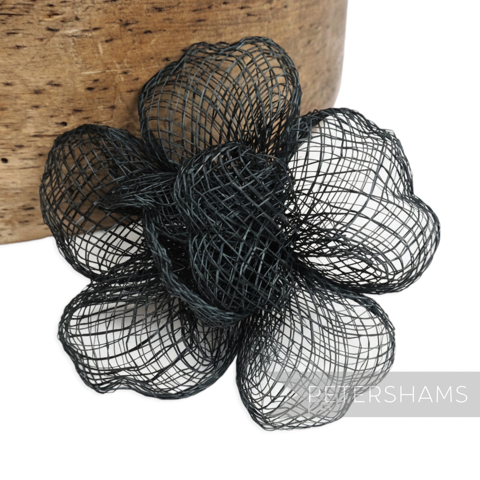 Petershams Millinery Supplies black sinamay flower hat mount with crimped petals, 9-10cm width.