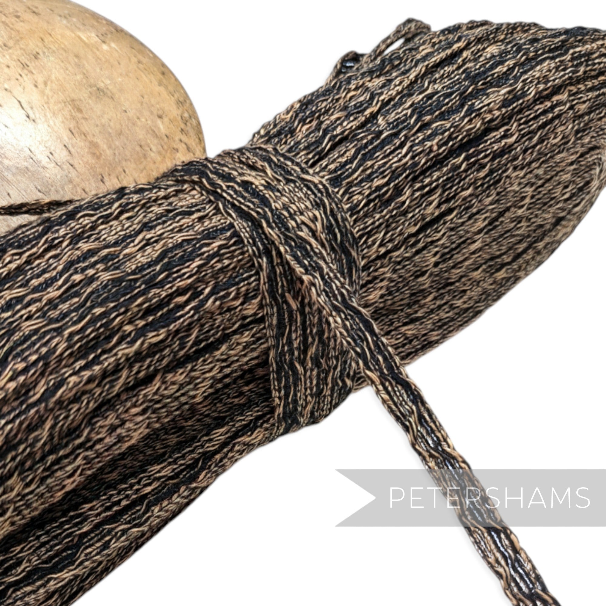Petershams Millinery Supplies 14mm black and tan threaded crinoline braid with zig-zag texture.