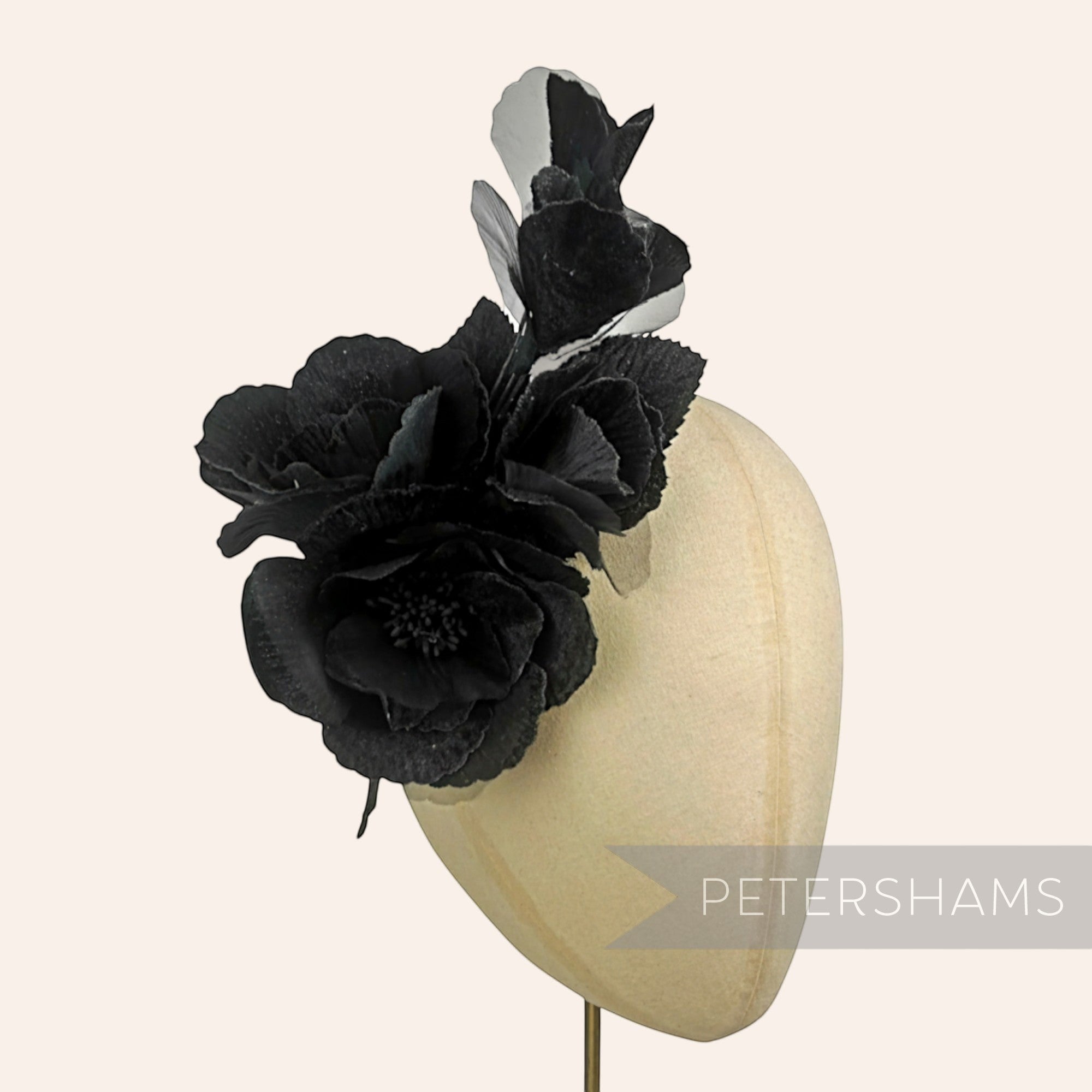 Petershams Millinery Supplies black velvet and organza flower hat mount, 20cm, with detailed petals and wired leaves.