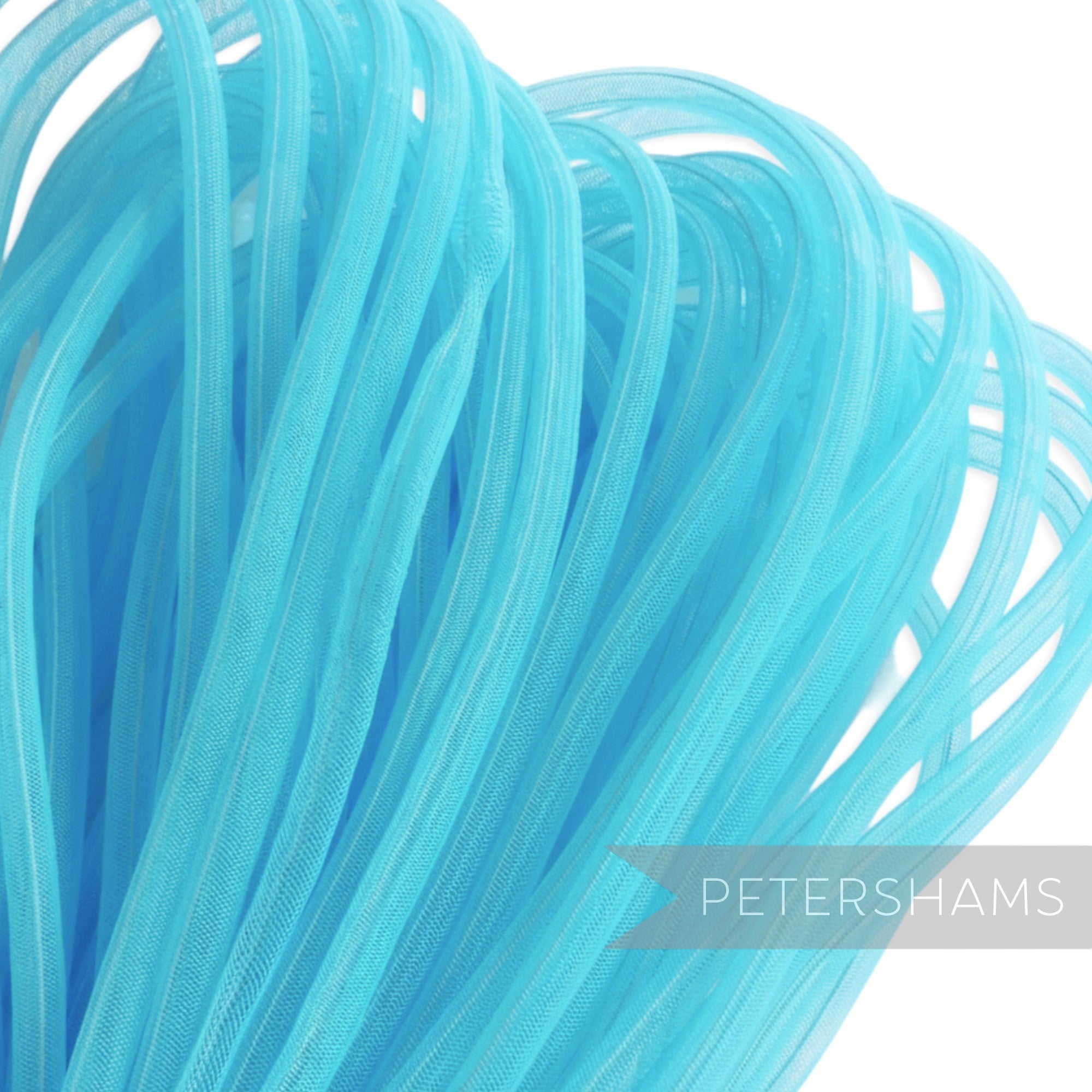 Petershams bright blue 8mm tube millinery crin, a mesh trim for hat making and embellishments.