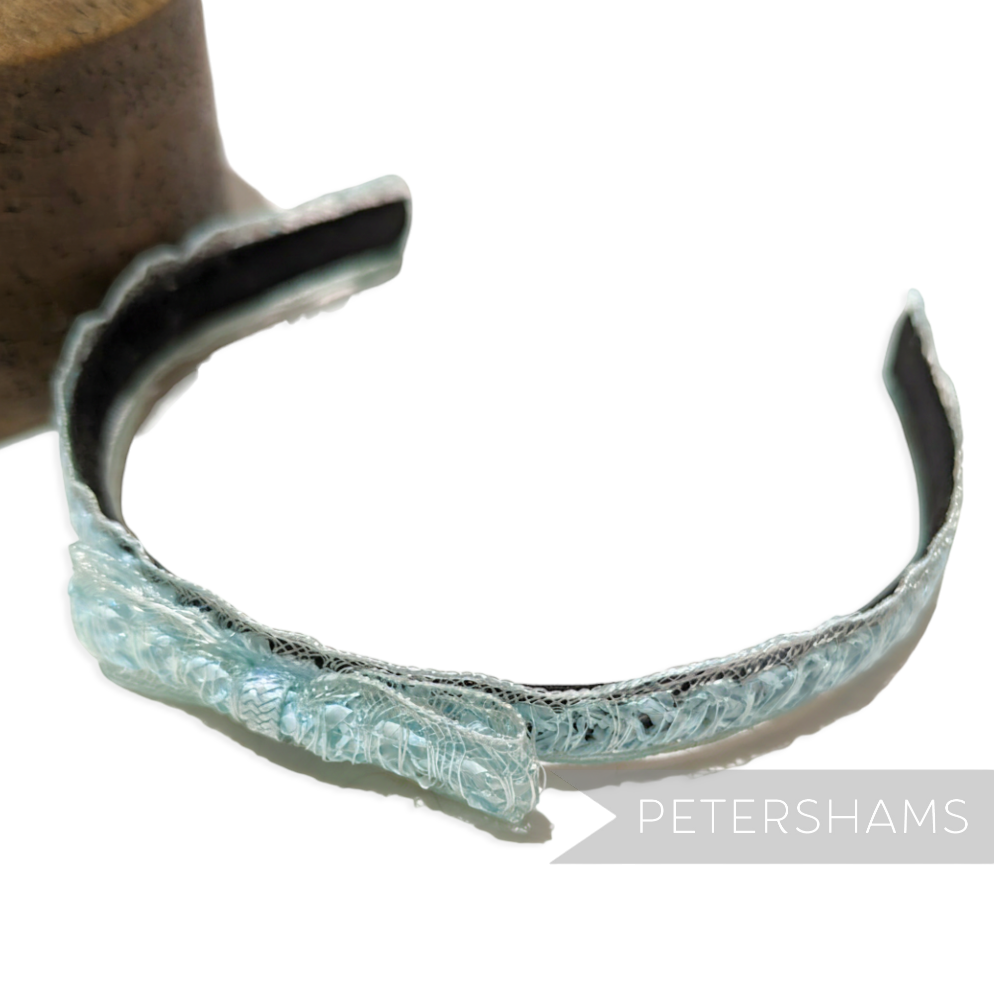 Petershams light blue laminated raffia and crin braid headband with a bow detail. Vintage 1960s style.