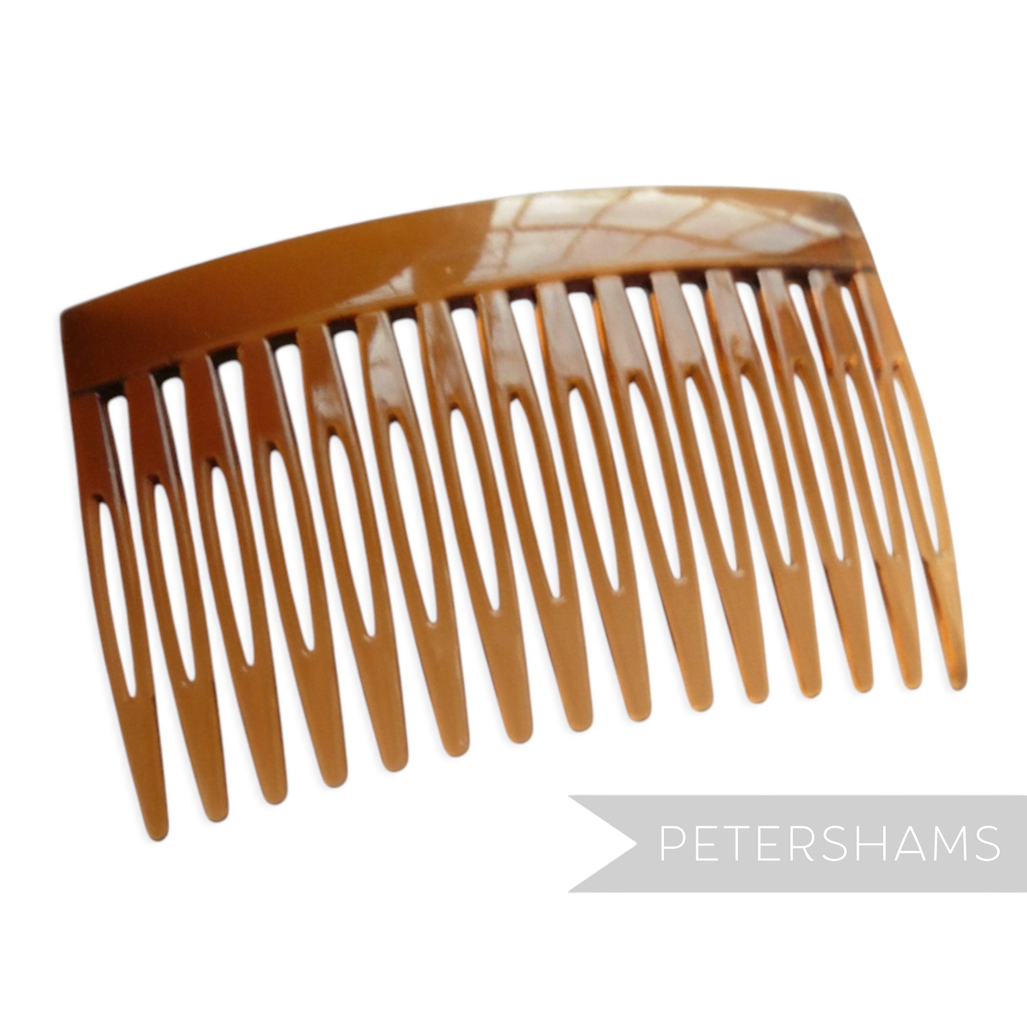 Petershams brown plastic 7cm hair comb, ideal for sewing into hats and veils.