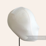 Petershams clear 7cm plastic hair comb, ideal for sewing into hats and veils.