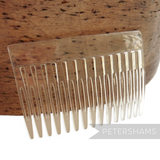 Petershams clear plastic hair comb, 7cm wide, ideal for millinery and veils.