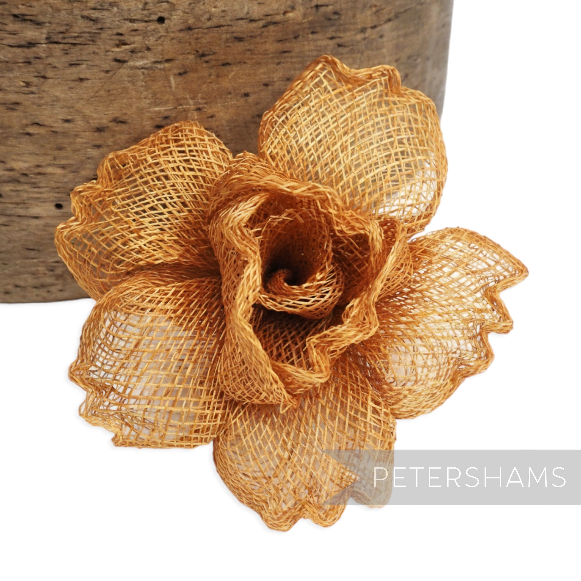 Petershams Millinery Supplies copper sinamay flower hat mount with crimped petals, 9-10cm wide.