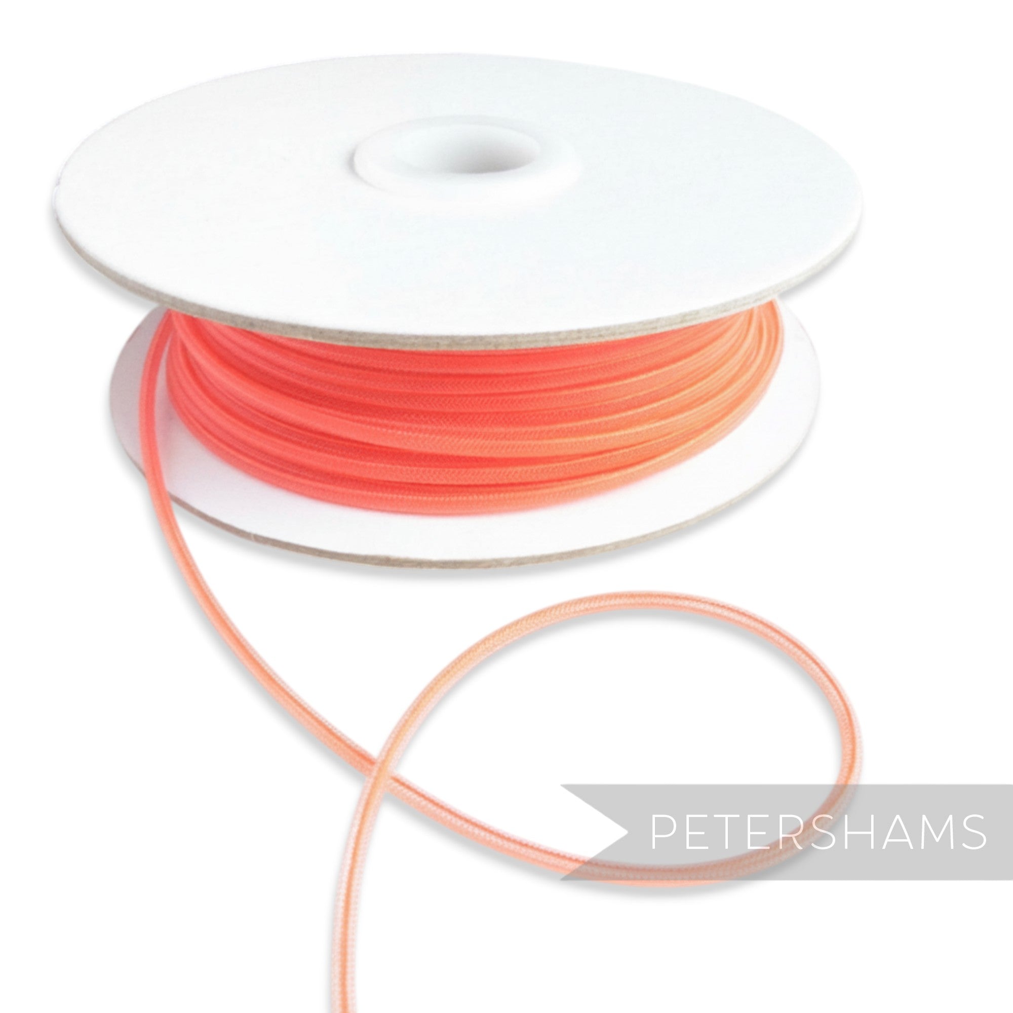 Petershams Millinery Supplies coral 2.5mm tubular crinoline trim with a central thread for gathering.