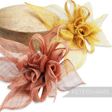 Petershams Millinery Supplies large layered sinamay flower hat mount in coral and gold, featuring rolled blossoms and leaves.