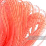 Petershams coral pink 8mm tube millinery crin for hat making and trims, slightly sheer with gathered threads.