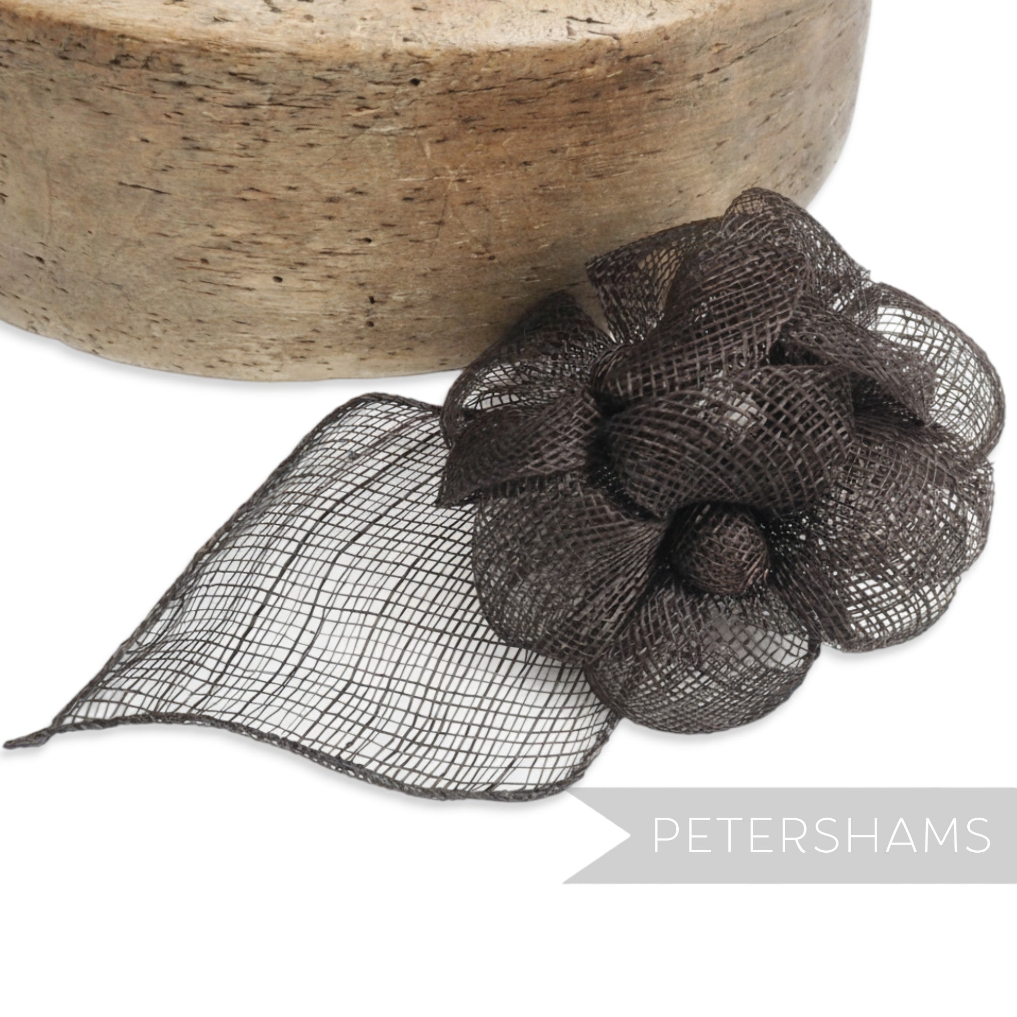 Petershams Millinery Supplies dark chocolate brown sinamay triple flower hat mount with leaf backing.