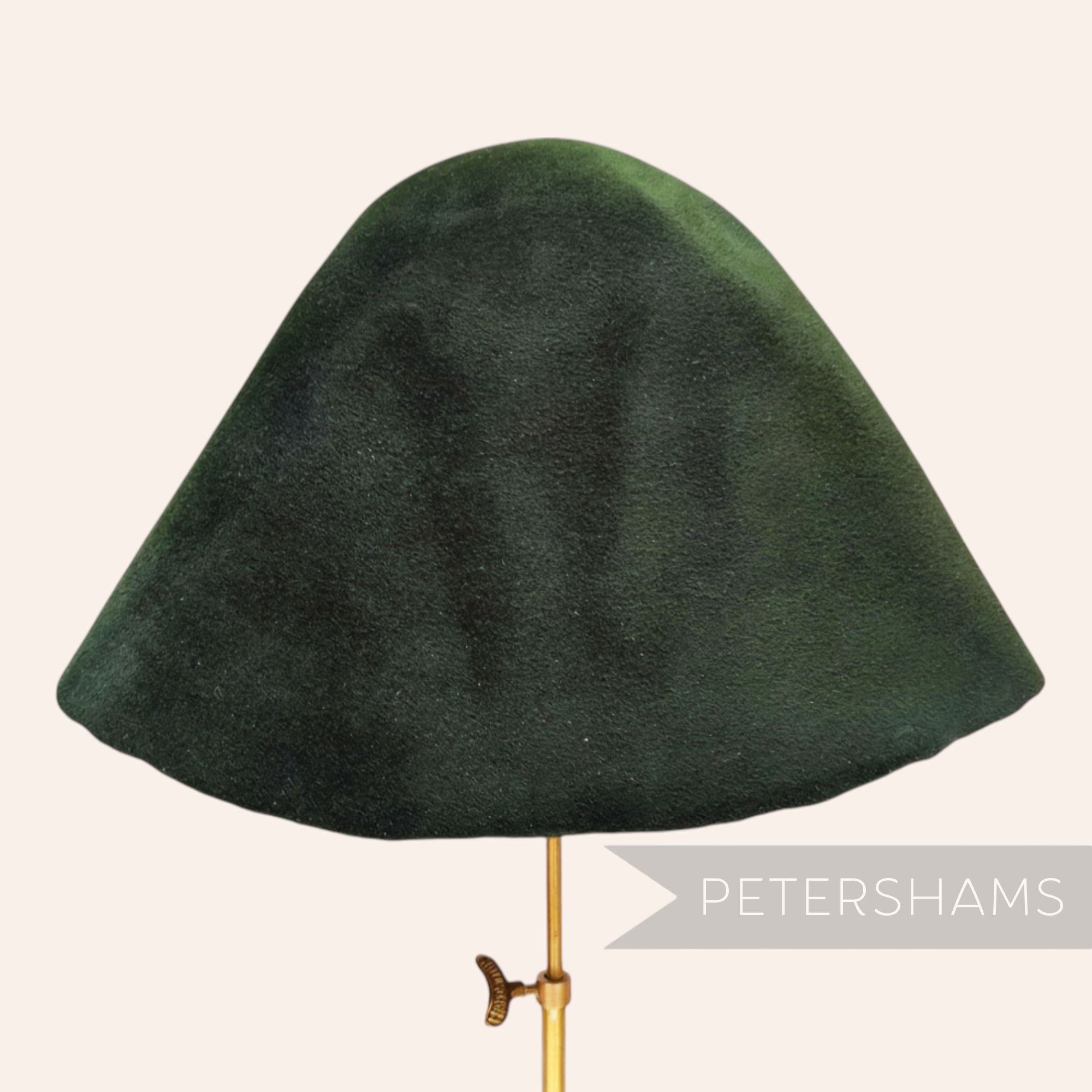 Petershams Millinery Supplies dark green velour fur felt cone hat body made from hare fibres.