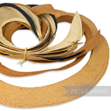 Petershams Millinery Supplies Ecuador Panama straw brim offcuts in natural, tan, and navy tones. Ideal for hat trims.