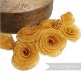 Petershams Millinery Supplies gold sinamay flower and leaf hat mount, 20cm wide.