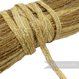 Petershams 14mm gold and white threaded crinoline braid with a raised zig-zag surface pattern, ideal for millinery.