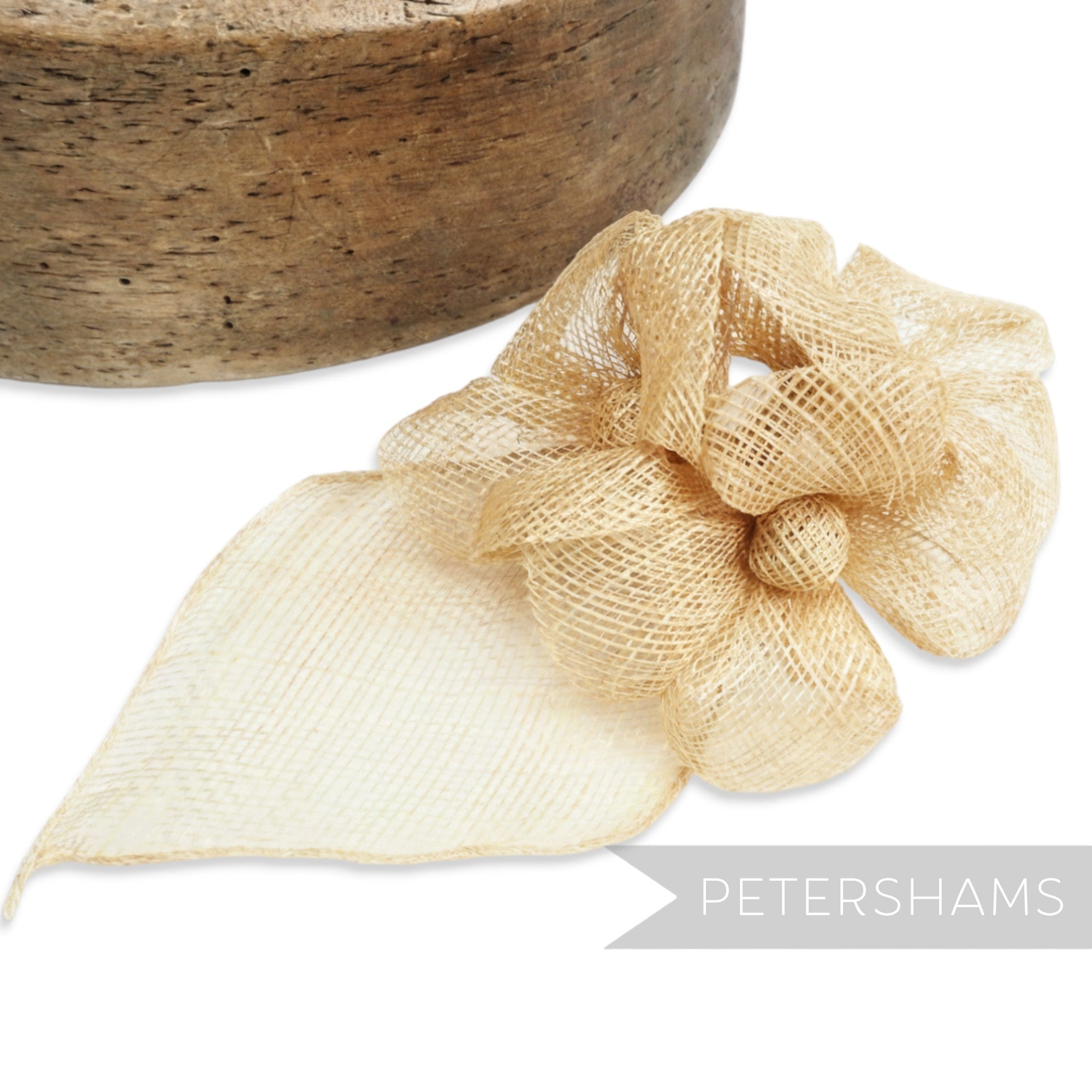 Petershams Millinery Supplies 'Zoe' golden sinamay hat mount with triple flowers and leaf backing.