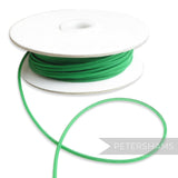 Petershams green 2.5mm tubular millinery crin on a spool, ideal for headbands and graphic shapes.