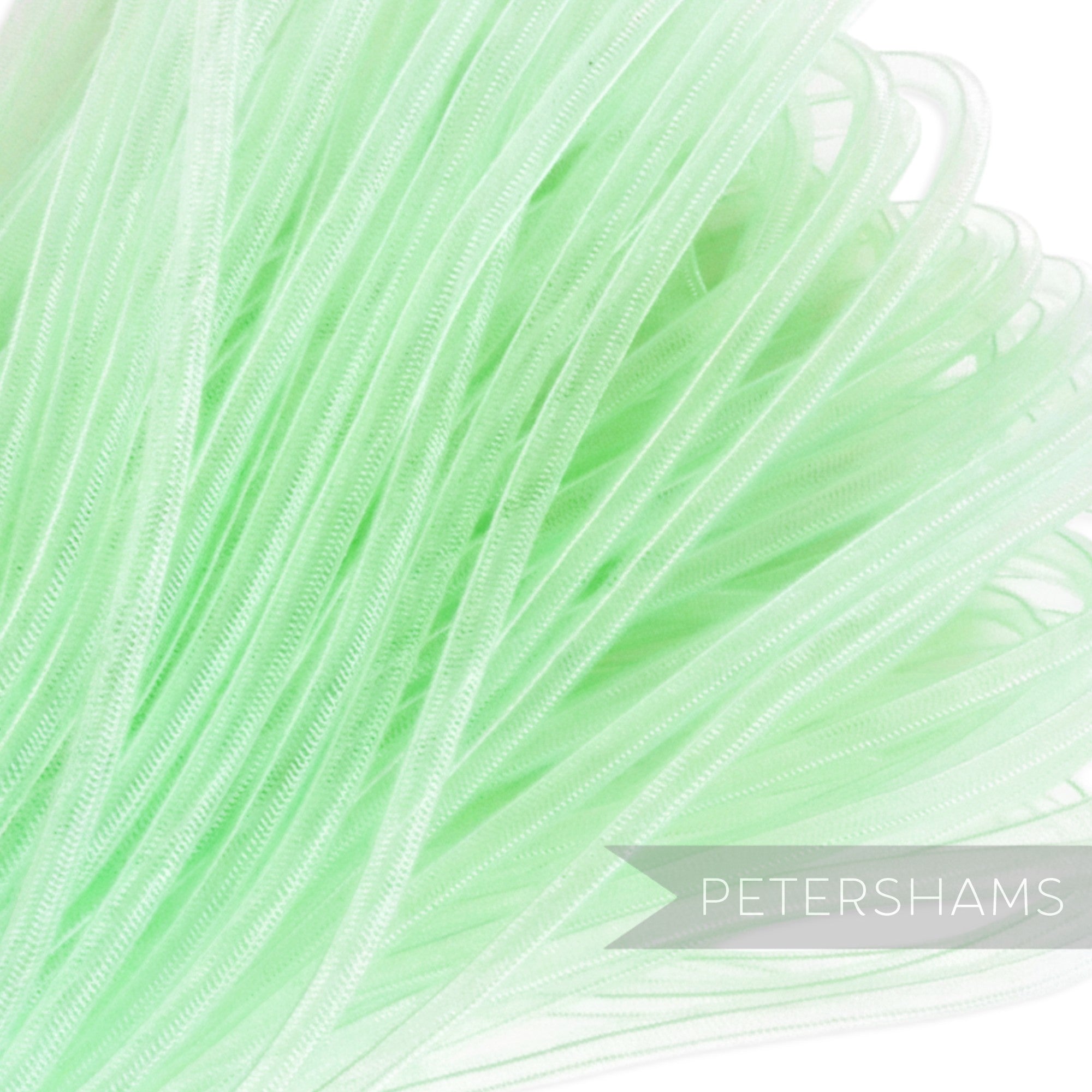 Petershams light green 6mm tube millinery crin, slightly sheer with gathered threads, ideal for hat making and trims.