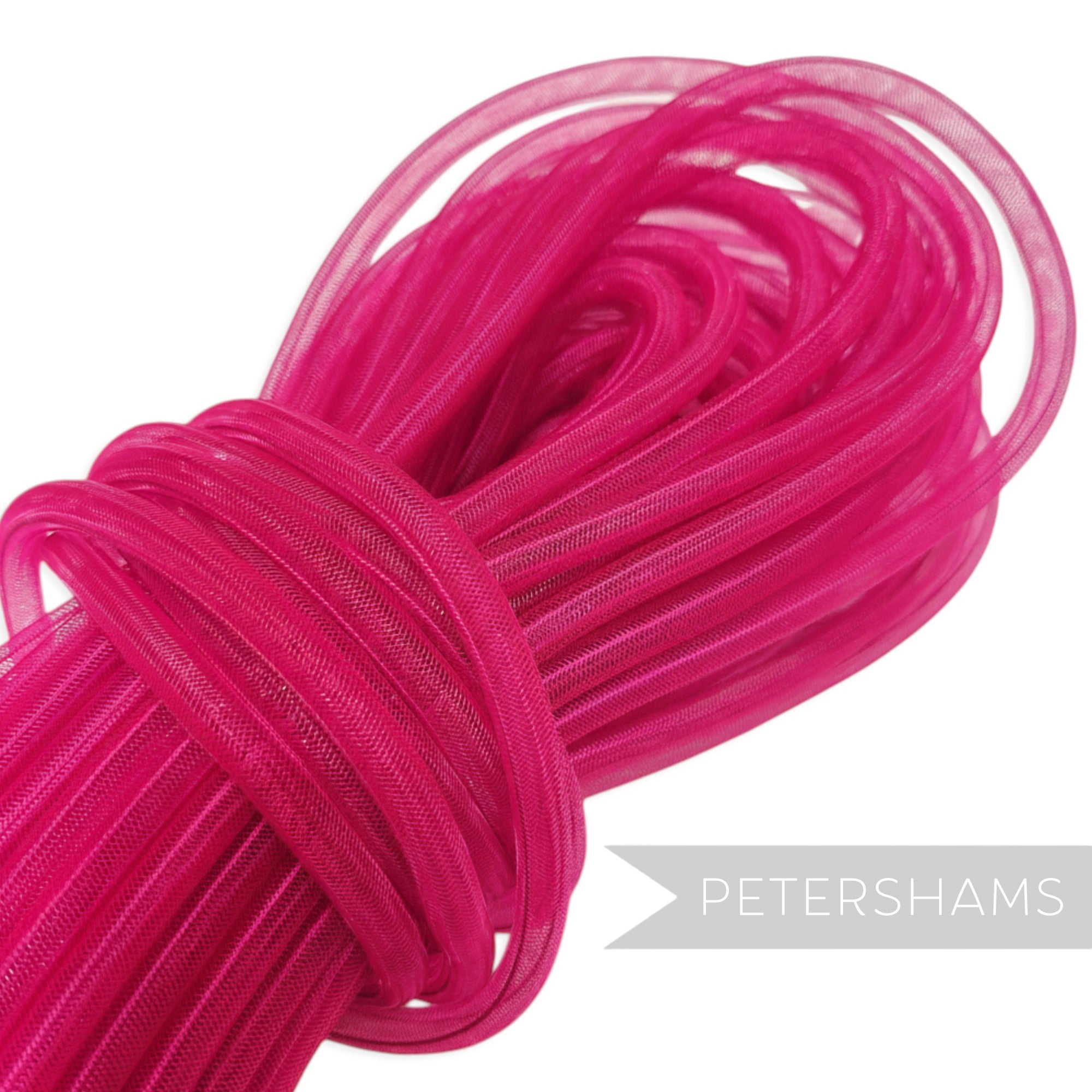 Petershams hot pink 8mm tube millinery crin, a sheer mesh trim for hat making and embellishments.