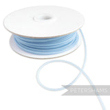 Petershams light blue 2.5mm tubular millinery crinoline with a central thread for gathering.