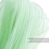 Petershams light green 8mm tube millinery crin, a sheer synthetic material with threaded sides for gathering, ideal for hat making trims.