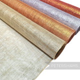 Petershams Millinery Supplies metallic lurex threaded sinamay fabric in beige, orange, silver, and red. Ideal for hats.