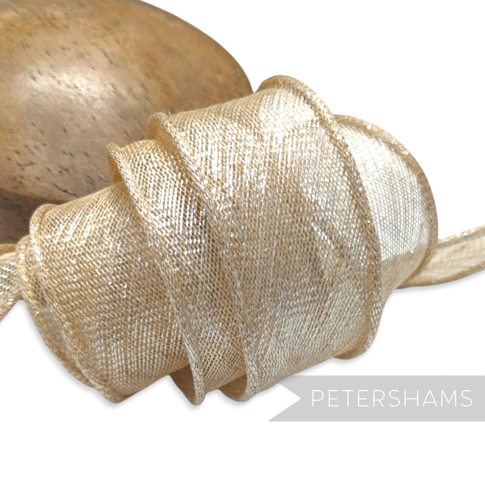 Petershams Millinery Supplies metallic gold lurex sinamay ribbon trim with hand-rolled edges, perfect for hat making.