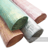 Petershams Millinery Supplies lurex threaded polyester abaca fabric in pink, mint green, and silver. Ideal for headpieces.